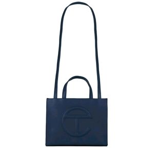 Lightly used medium navy blue Telfar tote